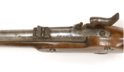 A two band percussion Military carbine of Indian use, regulation brass mounts, fold leaf rear sight, regulation brass mount, lock with Indian marks and also crowned VR, barrel 66.2cm